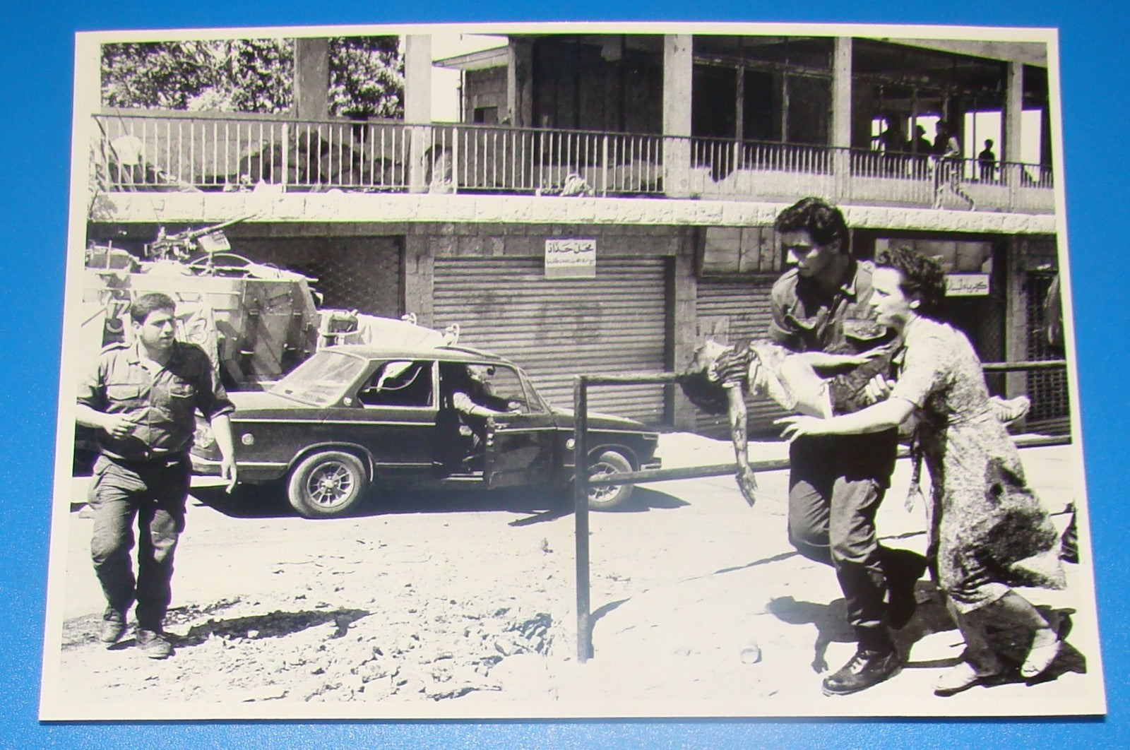 1982 Israel Press Photo Lebanon War IDF Soldier Helping Lebanese Boy Bhamdoun